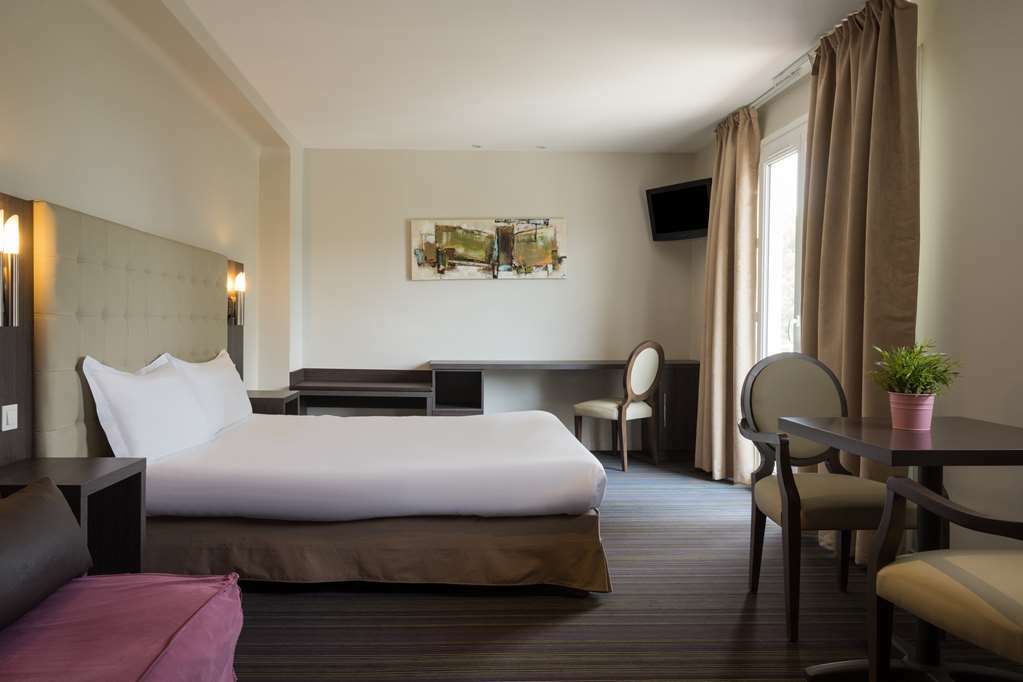 Hotel The Originals Perpignan Sud Le Grillon D'Or Le Boulou Rum bild